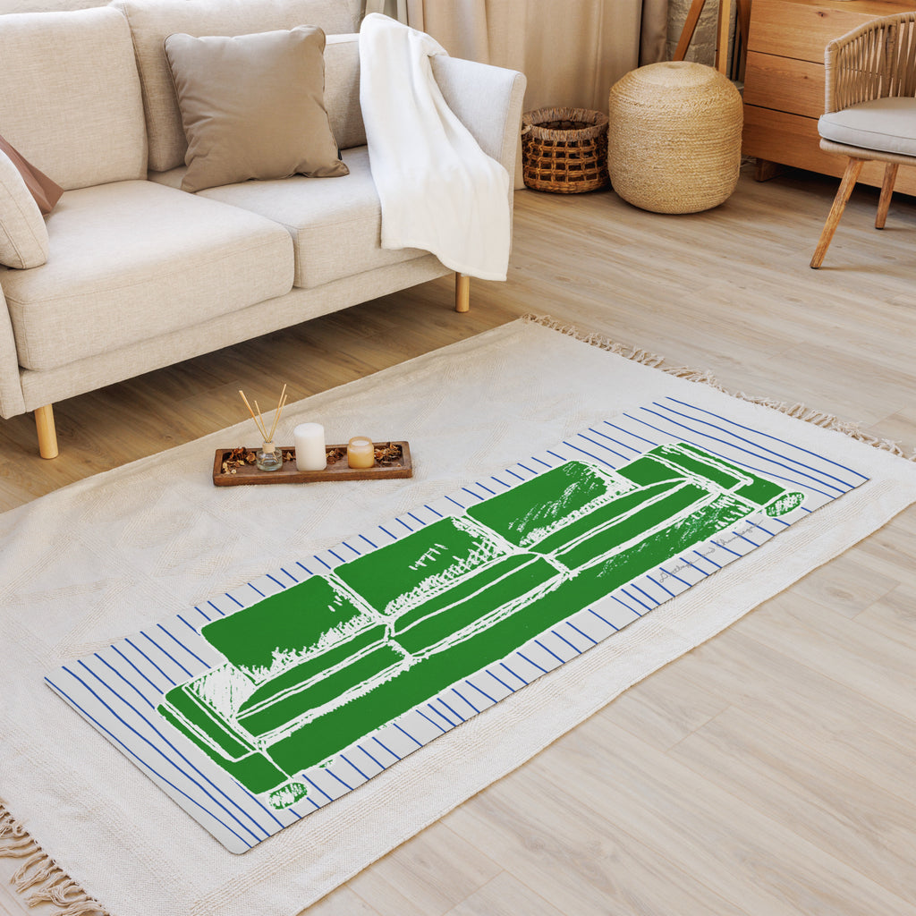 Green and White couch on blue Breton stripesYoga mat