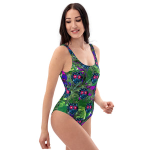 blue tiger with flower eyes, green leaves and Daphne One-Piece Swimsuit